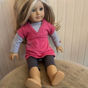 American Girl Doll with Pink Dress and Gray Leggings